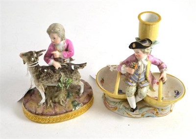 Lot 343 - A late Meissen porcelain figure of a boy with a goat and a late Meissen figural candlestick as...