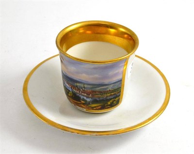 Lot 344 - A Russian Carl Tielsch porcelain cup and saucer painted with a view of Hameln, marked in underglaze