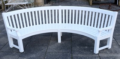 Lot 1177 - A Modern White-Painted Curved Wooden Bench,...