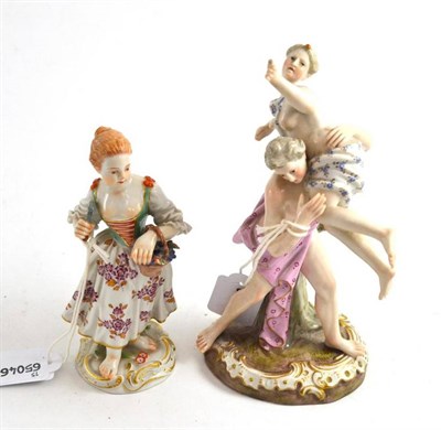 Lot 352 - A late Meissen porcelain classical figure group and another of a girl with a basket of grapes...