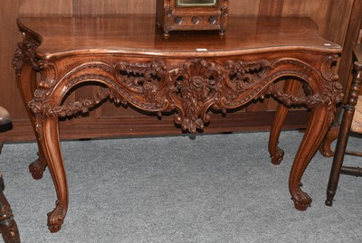 Lot 1169 - A Reproduction Italian Style Serpentine Carved...