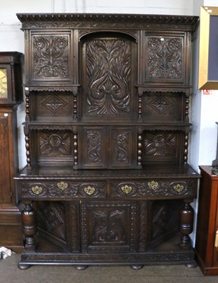 Lot 1335 - A Victorian Carved Oak Dresser, decorated with...