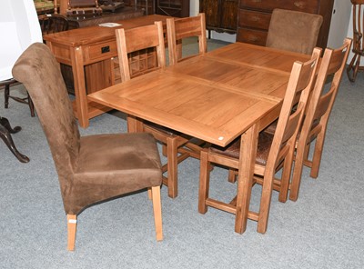 Lot 1147 - A Modern "HALO" Oak Drawer Leaf Dining Table,...