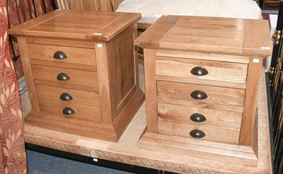 Lot 1226 - A Pair of Modern "Halo Living" Oak Four-Drawer...