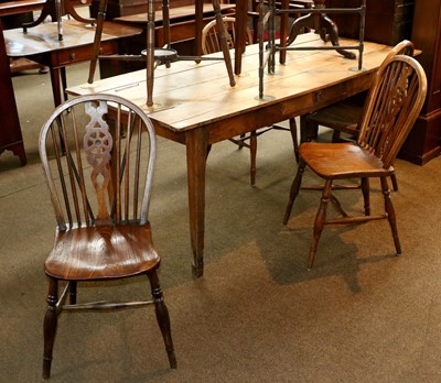 Lot 1353 - An Elm Provincial Kitchen Table, with single...