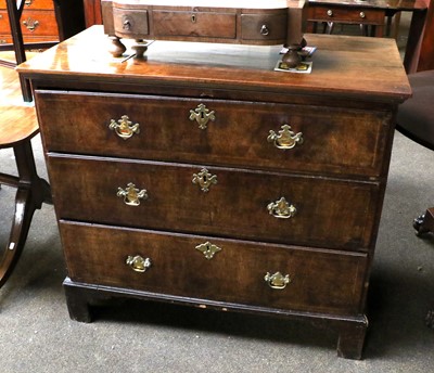 Lot 1370 - An 18th Century Walnut Three Height Chest of...