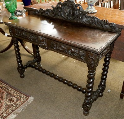 Lot 1402 - A Victorian Carved Oak Side Table, with two...