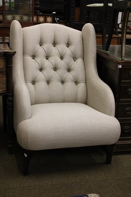 Lot 1423 - A Reproduction Button Back Wing Armchair