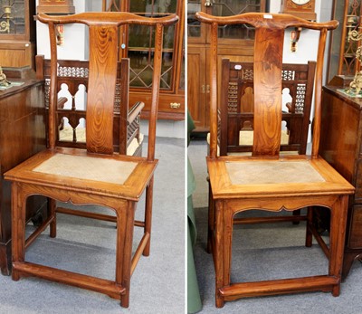 Lot 1244 - A Pair of Chinese Elm Chairs, with yoke crest...