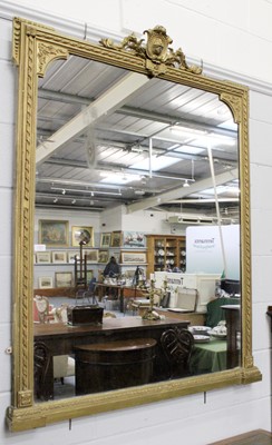 Lot 1207 - A Victorian Overmantel Mirror, in carved gilt...