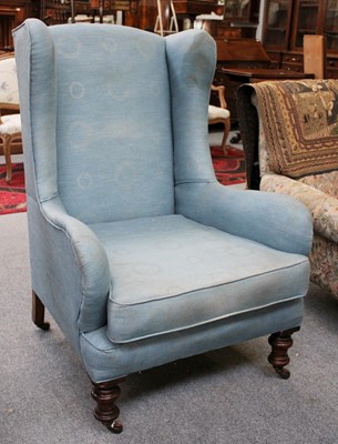 Lot 1271 - A Victorian Wing Chair, upholstered in blue