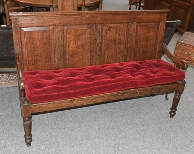 Lot 1126 - An 18th Century Oak Four Panelled Settle,...