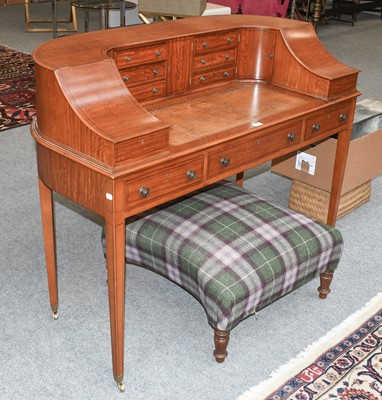 Lot 1302 - A Satinwood Carlton House Desk, of typical...