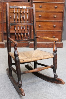 Lot 1248 - A Child's Oak Rocking Chair, 18th century,...