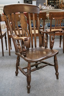 Lot 1282 - An Elm Country Chair