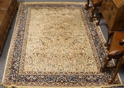 Lot 1022 - A Machine Made Carpet of Oriental Design, the...