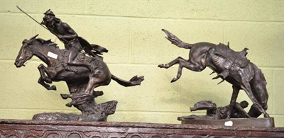 Lot 410 - After Frederic Remington, pair of bronze figure groups of an Indian on horseback and a bucking...