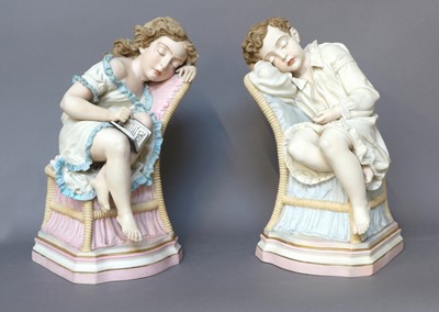 Lot 176 - A Pair of Polychrome Bisque Figures of Seated...