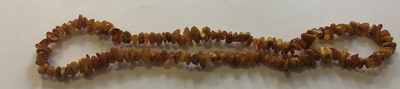 Lot 116 - Six Amber/Amber Type Necklaces, of varying...