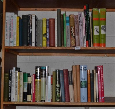 Lot 430 - A collection of books on snakes and other reptiles (two shelves)