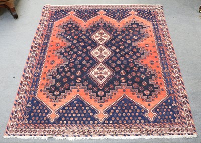 Lot 1006 - An Afshar Rug, the crenallated indigo field...