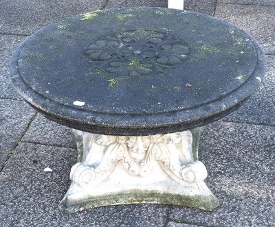 Lot 1152 - A Composition Stone Garden Table, the moulded...