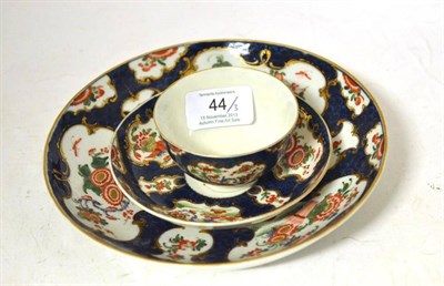 Lot 44 - A First Period Worcester Tea Bowl and Saucer, circa 1770, painted in Kakiemon palette with Oriental