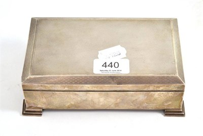 Lot 440 - A modern silver cigarette box, maker's mark worn, Birmingham 1961