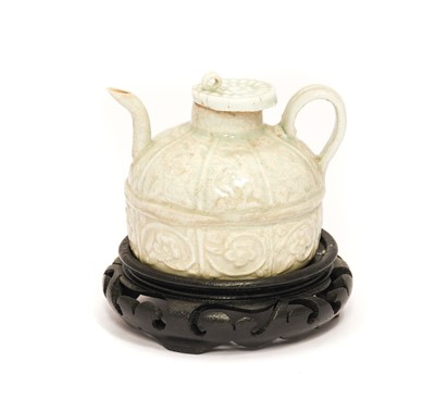 Lot 269 - A Chinese Qingbai Wine pot and Cover, probably...