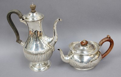 Lot 104 - A Victorian Silver Teapot and a Victorian...