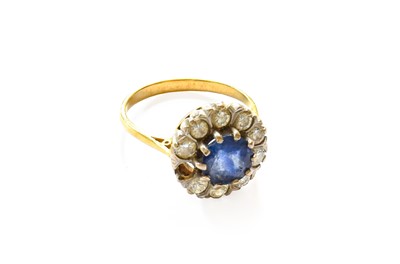 Lot 123 - A Sapphire and Diamond Cluster Ring, finger...