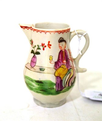 Lot 47 - A Lowestoft Porcelain Sparrow Beak Jug, circa 1775, painted in colours with chinoiserie figures...