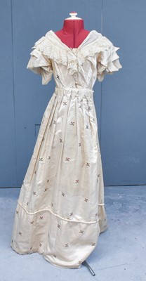 Lot 2010 - Mid 19th Century Cream Silk Dress, self woven...