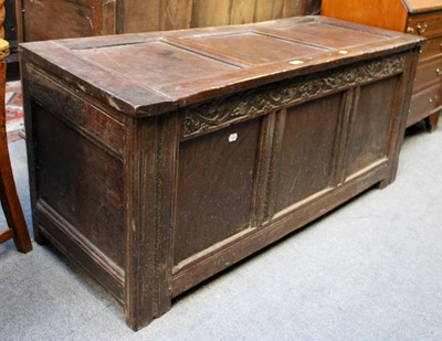 Lot 1329 - An 18th Century Carved Oak Three Panel Coffer,...