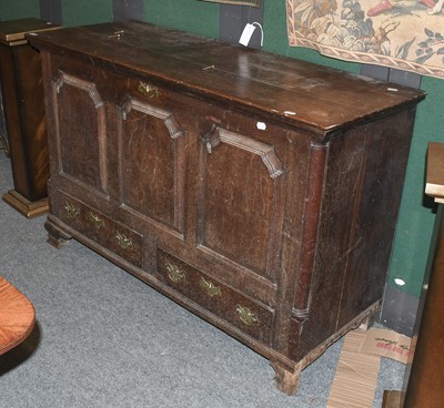 Lot 1101 - An 18th Century Oak Mule Chest, the...