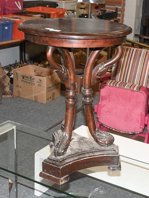 Lot 1111 - A 19th Century Carved Mahogany Lamp Table, the...