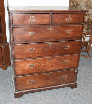 Lot 1133 - A George III Oak Straight Front Chest of...