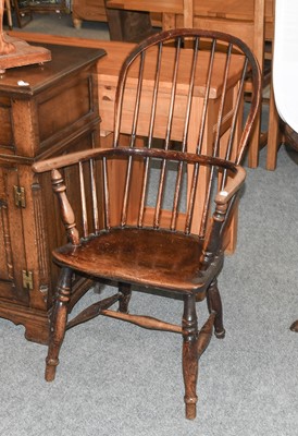 Lot 1151 - An 19th Century Ash and Elm Windsor Chair