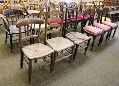 Lot 1184 - A Set of Four Victorian Carved Mahogany Dining...