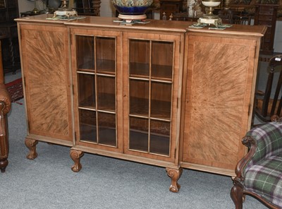 Lot 1163 - A Reproduction Walnut Break Front Bookcase,...