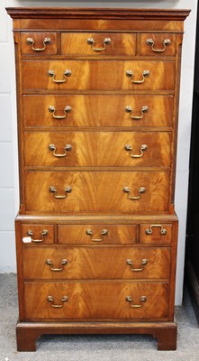 Lot 1210 - A Reproduction Cross Banded Mahogany Chest on...