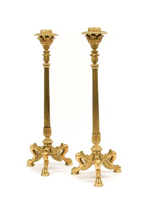 Lot 341 - A Pair of French Gilt Metal Candlesticks, in...