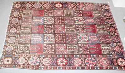 Lot 1016 - A Bakhtiari Carpet, the compartmentalised...