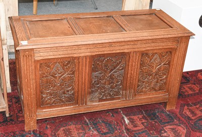 Lot 1145 - A 20th Century Carved Oak Three Panel Coffer,...