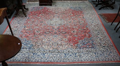 Lot 1276 - A Saroukh Carpet, the faded strawberry field...