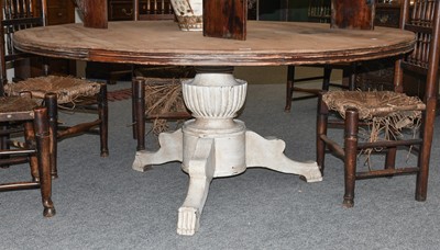 Lot 1172 - A Large Rustic Country Dining Table, the...