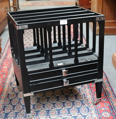 Lot 1236 - A Modern Ebonised Caterbury, with chrome...