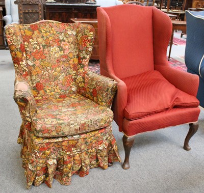 Lot 1285 - A George III Style Wing Back Armchair, on...