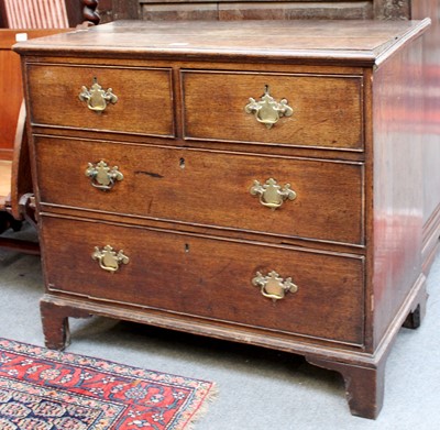 Lot 1237 - A George II Oak Batchelors Chest of Drawers,...