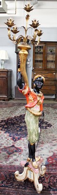 Lot 1119 - A 20th Century Blackamoor Lady, on scroll base,...